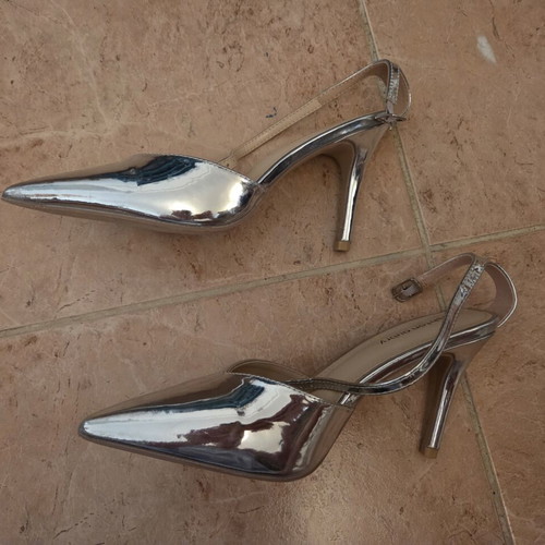 Ashton Aubry silver metallic slingback pumps
