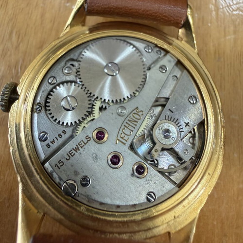 Technos wind-up watch like new, unisex, gold color