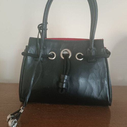 Folli Follie black women's handbag used, leather with red lining