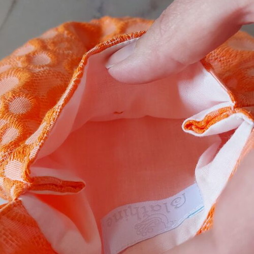 Blathine small orange crossbody bag