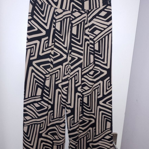 Pants size small medium with geometric patterns, wide comfortable fit, elastic waist, like new