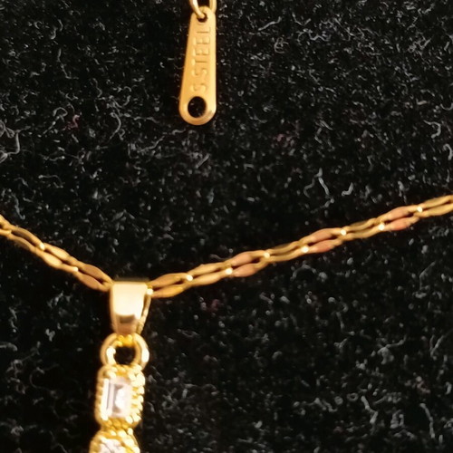 Women's cross new with zircon in gold color