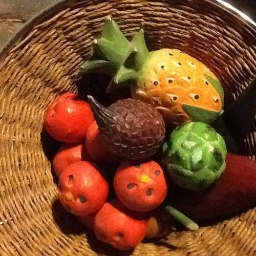 Wooden handmade fruits used with handmade wicker fruit basket