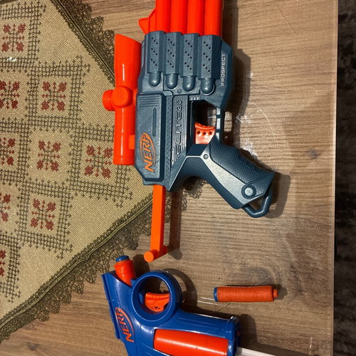 Nerf pistols used, pack with darts