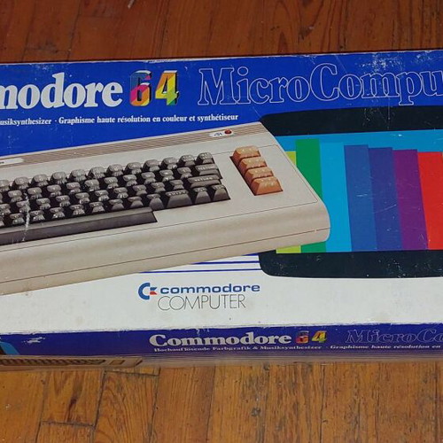 Commodore 64 like new with original box and warranty sticker