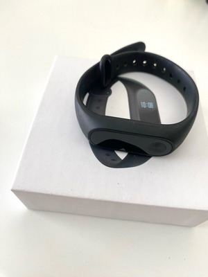Xiaomi Mi Band 2 with two straps, one black and one blue in excellent condition