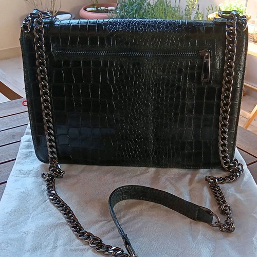 Black leather crossbody bag like new with silver chain