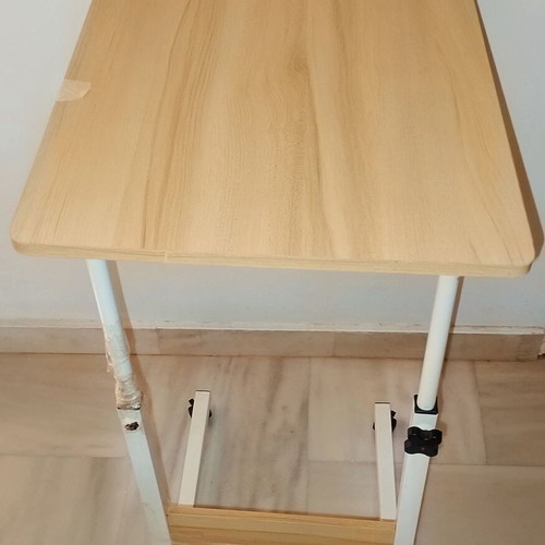 Auxiliary table used, needs repair with metal frame