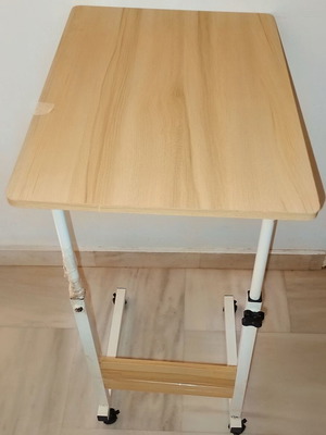 Auxiliary table used, needs repair with metal frame