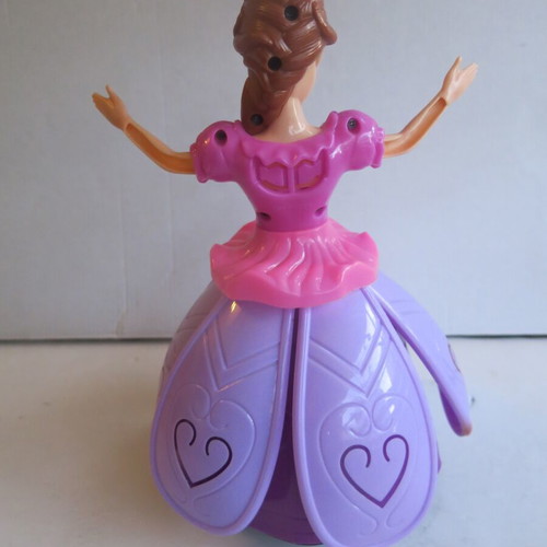 Disney Frozen Spinning Princess Anna 3D figure used, pink with light and music