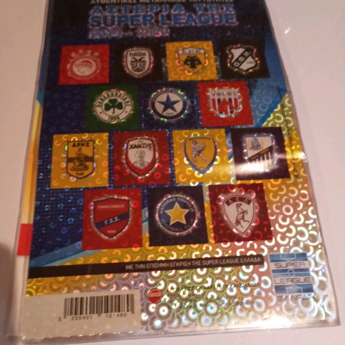 Super League collectible album with 44 metal tags used