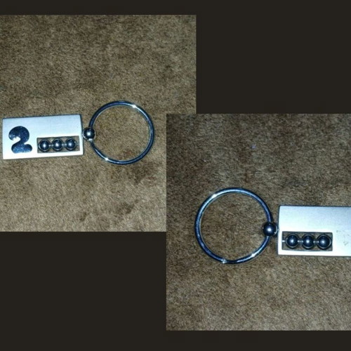 Vintage keychain limited edition 2000, like new, gray