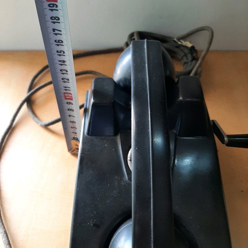 Antique telephone with crank used, 1920-30