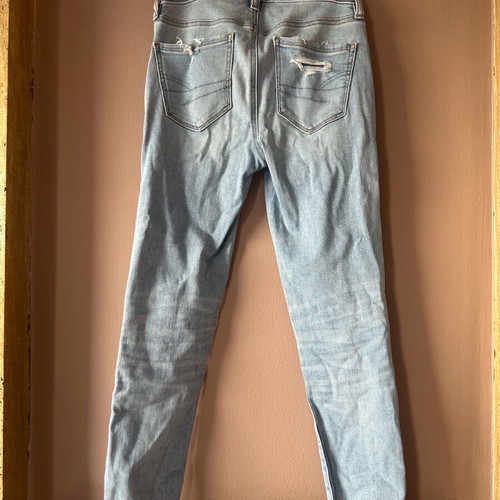 American Eagle stretch jean with rips new size S