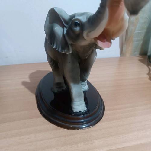 Vintage decorative elephant used with wooden base