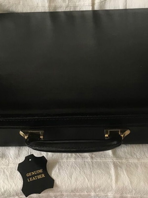 Genuine Leather Briefcase new, black with gold locks