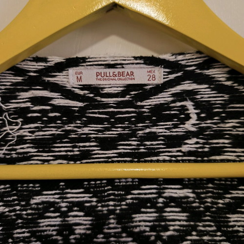 Asymmetric cardigan used with boho style, black and white