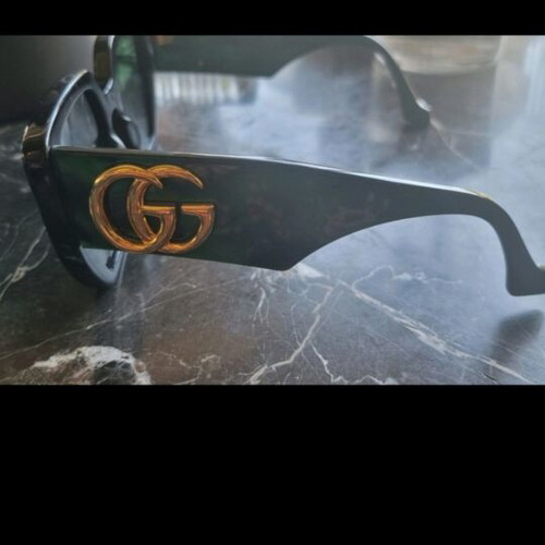Gucci sunglasses authentic like new