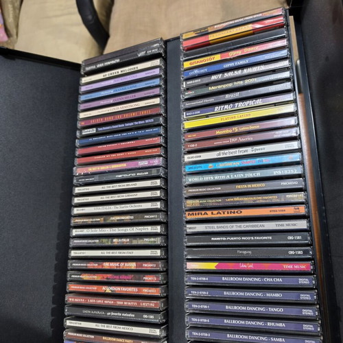 60 music CDs, mainly jazz and latin