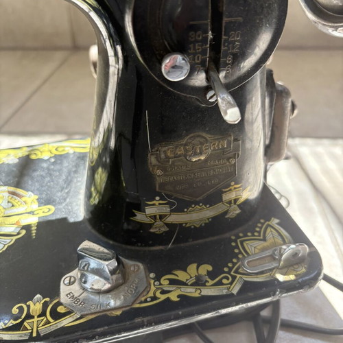 Vintage Eastern sewing machine used with gold Egyptian designs