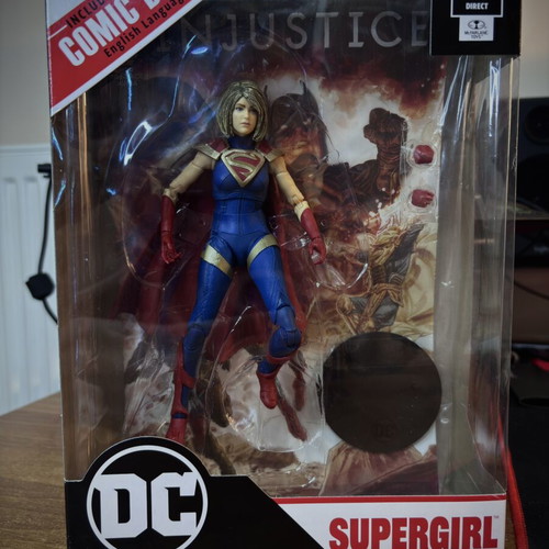 Supergirl figure like new from Injustice 2 with comic book