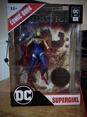 Supergirl figure like new from Injustice 2 with comic book