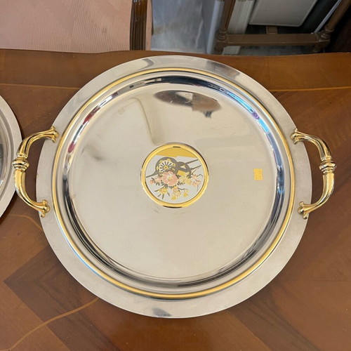 Serving dish made of steel with gold details like new