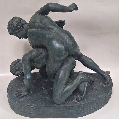 Gypsum statue with ancient Greek pankration athletes used