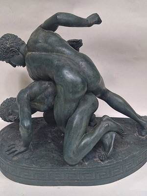 Gypsum statue with ancient Greek pankration athletes used