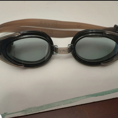 Swimming goggles like new with black lenses