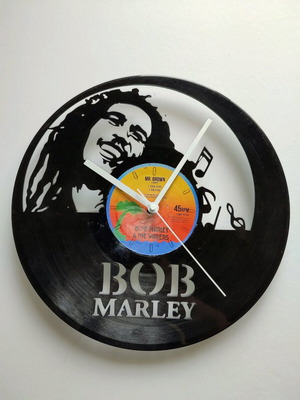 Vinyl record rolls with a design cut on it of Bob Marley