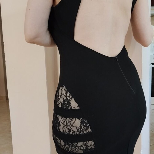 Black mini dress like new with open back and lace slit