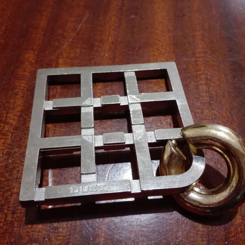 Cast Duet metal puzzle used, difficulty level 5