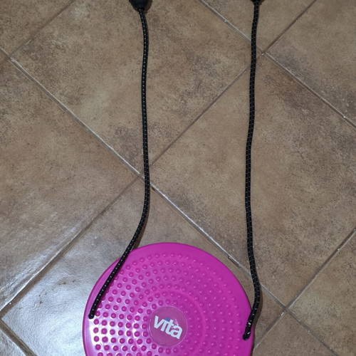 Gym equipment like new, pink rotating body exerciser