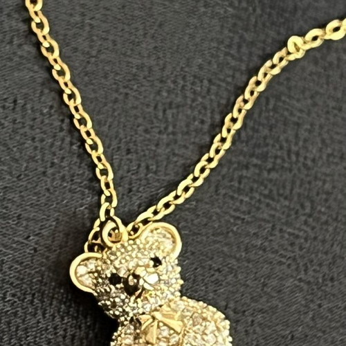 Necklace with gold-tone steel bear pendant, new