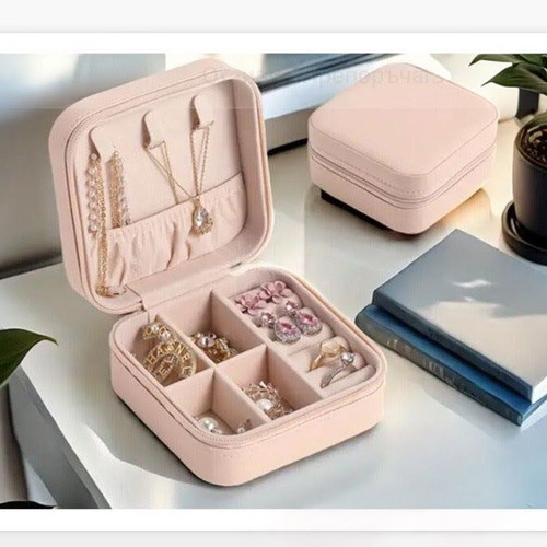Portable jewelry organizer new, pink, with zipper and compartments