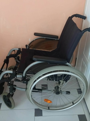 Ottobock folding wheelchair new with brakes and side footrests, 12 kg