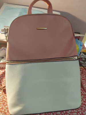 Women's backpack like new, adjustable straps, white and pink