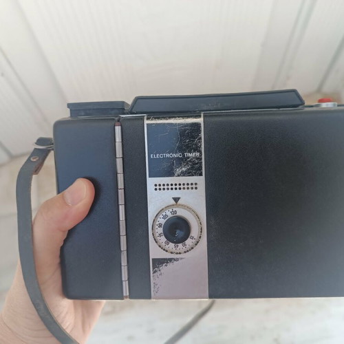 Polaroid Automatic 450 Land Camera like new, folding with glass lens