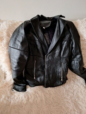 Women's black faux leather jacket with fur lining new