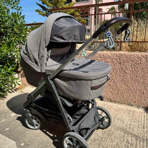 Inglesina Aptica stroller used with car seat and footmuff