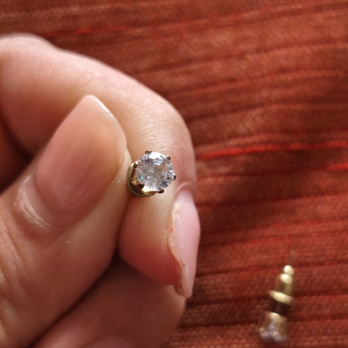 Gold-plated stud earrings with transparent zircon stones, like new
