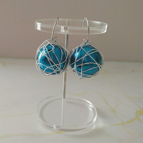 Handmade earrings with steel clasps and blue pearl bead, made to order