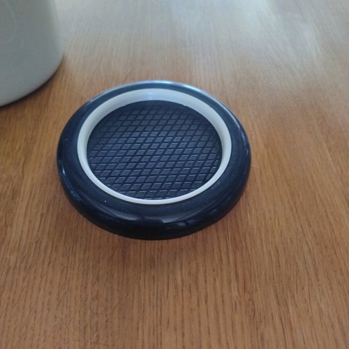 Plastic coasters used, set of 5 with holder