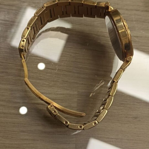 Vogue wristwatch like new, gold stainless steel with decorative stones