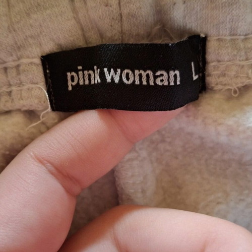 pink woman tracksuit