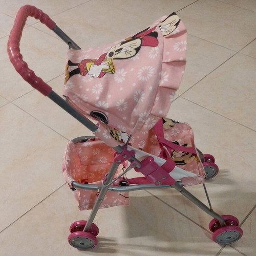 Doll stroller like new with 2 babies and accessories