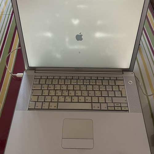 Apple PowerBook G4 15-inch laptop with original charger