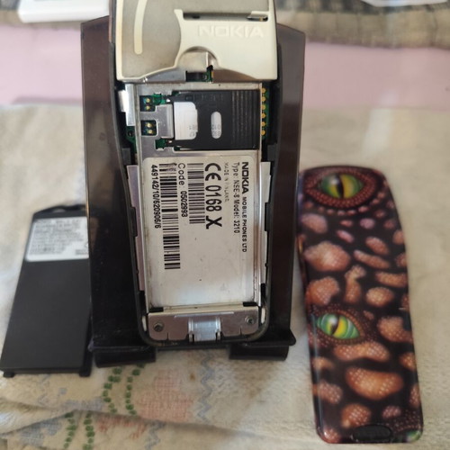 Nokia 3210 vintage cell phone used with new battery and front cover