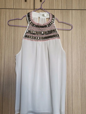 Women's top with sequins used, white with pink embroidery, size M